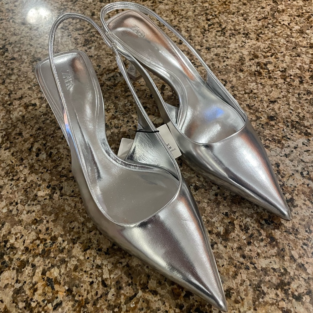 Pointed toe silver heels